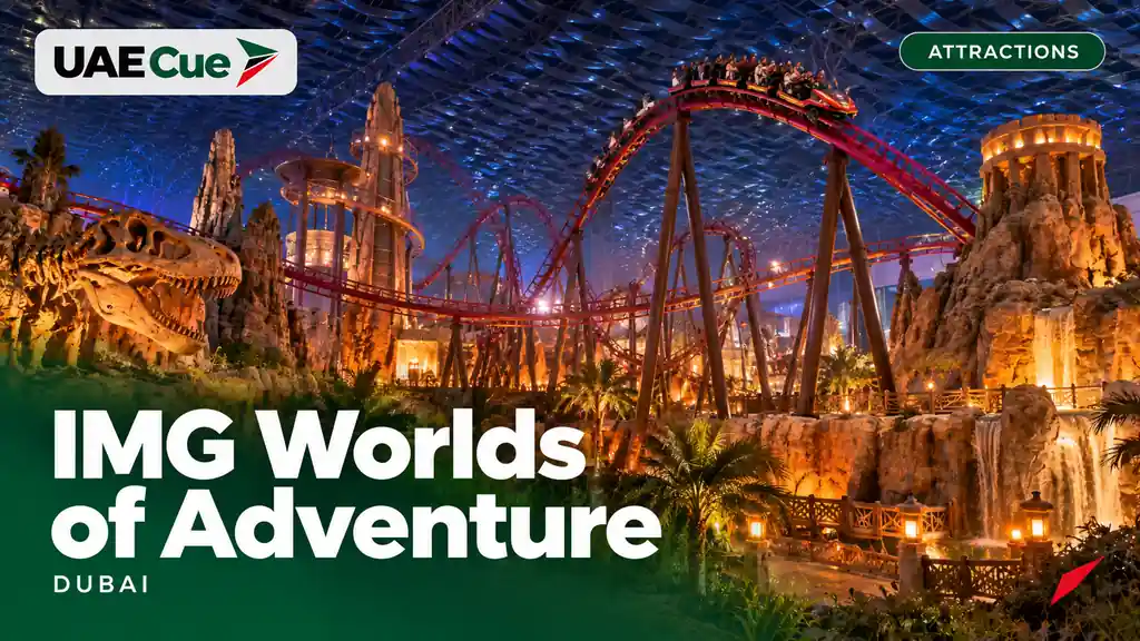 Editorial illustration for the IMG Worlds of Adventure guide, showing an indoor roller coaster beneath a large themed hall.